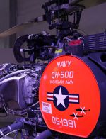 A katonai felhasználást mutatja, hogy a kiállításon egy ilyen, valódi - pilóta nélküli - bombázó drón helikoptert is bemutatnak, amely évtizedekig volt hadrendben.